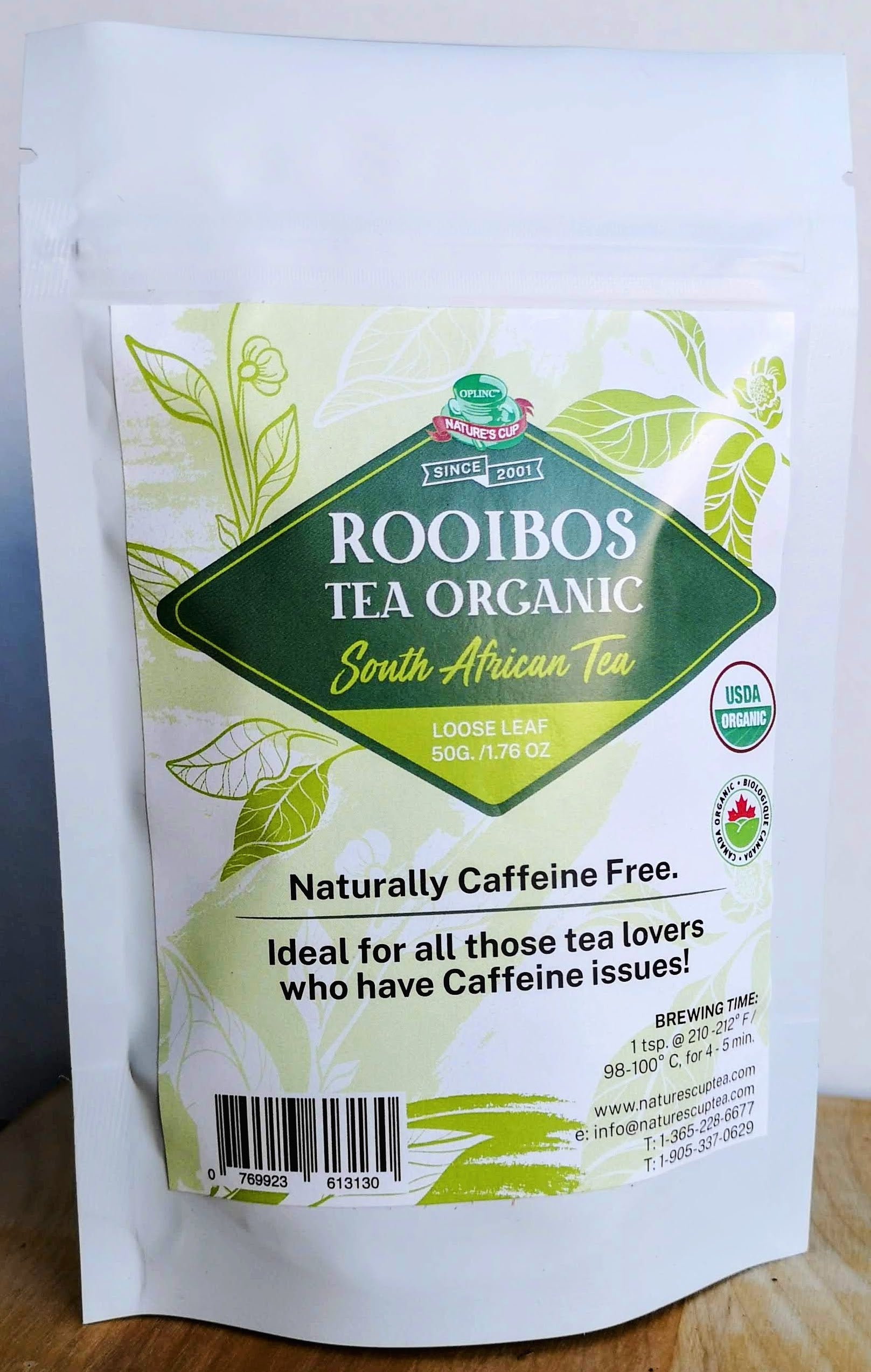 Rooibos tea organic certified from South Africa. Loose tea packed in 50 gram or 1.76 ounces. Rooibos tea is naturally caffeine free as it not a tea plat but a herb from South Africa. Elegant packaging with main details in dark green and surrounding details in lighter green on a white background.